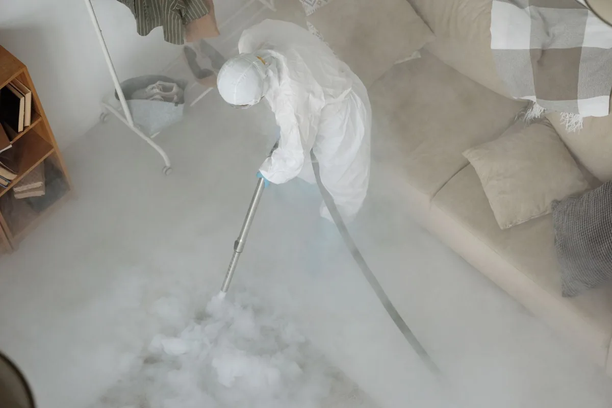 Biohazard cleanup technician in protective equipment, Independence, WI